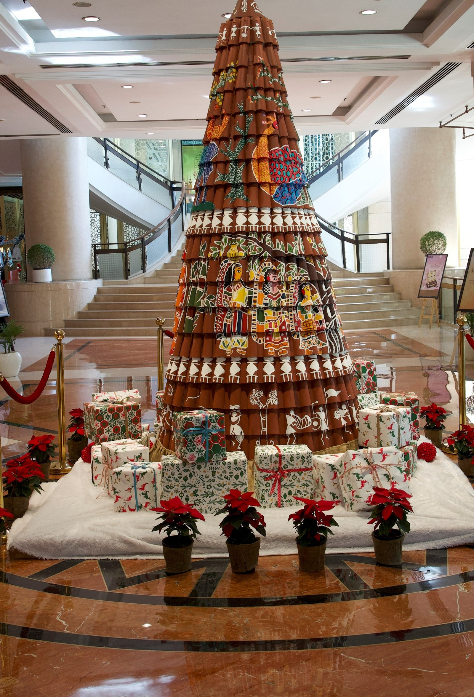 Christmas tree Welcomhotel Sheraton New Delhi is a tribute to the tribal arts of India.